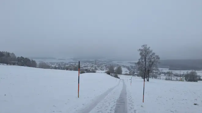 View of snowy Bad Leonfelden from Lug ins Land.