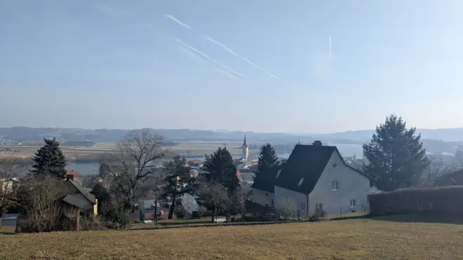 View over the old town of Ybbs from the church. The town church is located between two trees.