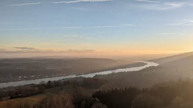 Sunset in Nibelungengau from Maria Taferl. Mist is forming in the Danube valley.